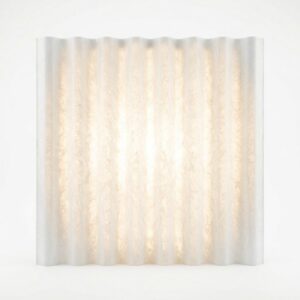 Translucent fiberglass corrugated sheet diffusing light for warehouse skylights and green sheds.